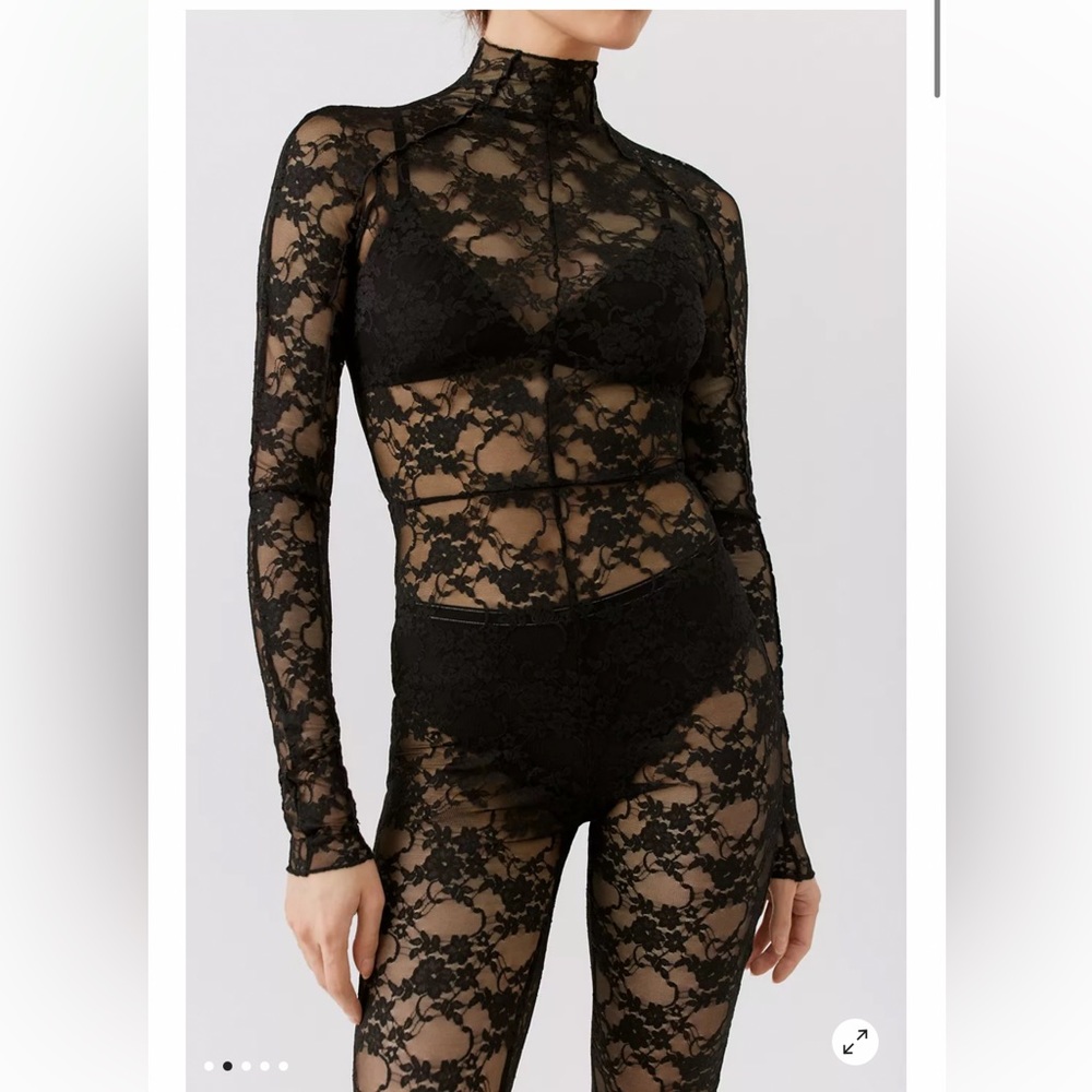 Black sheet lace jumpsuit from urban outfitters. Size large. Worn once